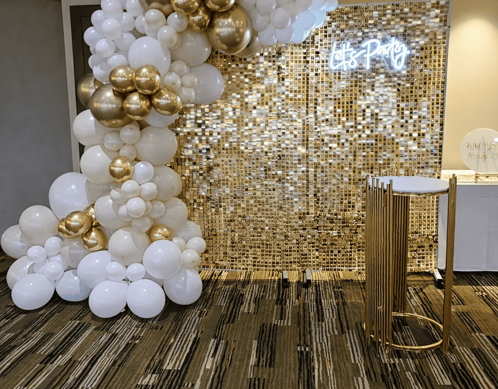Balloon arch with gold and white balloons for birthday event styling at JK DECO Melbourne.