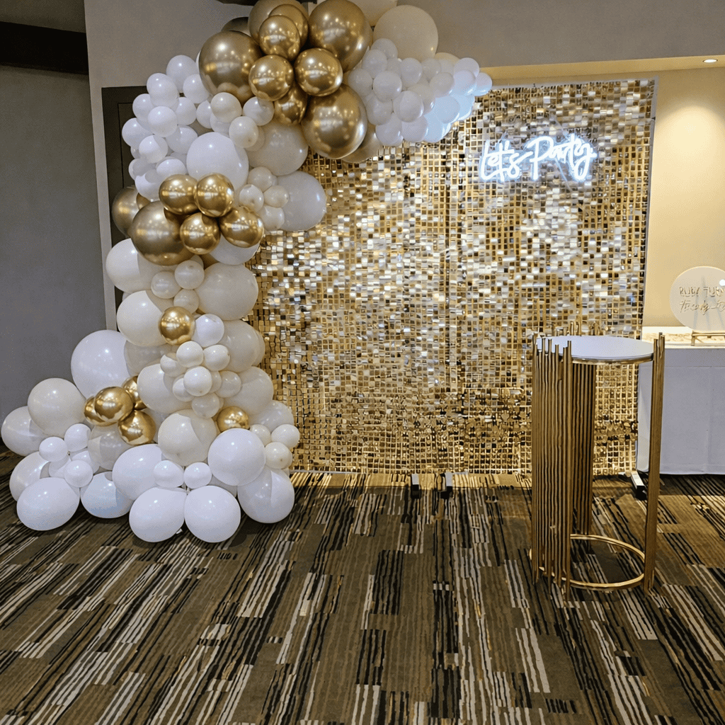 Balloon arch with gold and white balloons for birthday event styling at JK DECO Melbourne.